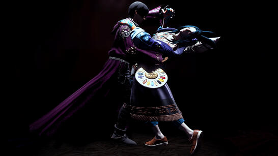 Fandaniel and Shun dance in an intensely dark background, with stark/harsh lighting illuminating them in sharp contrasts.